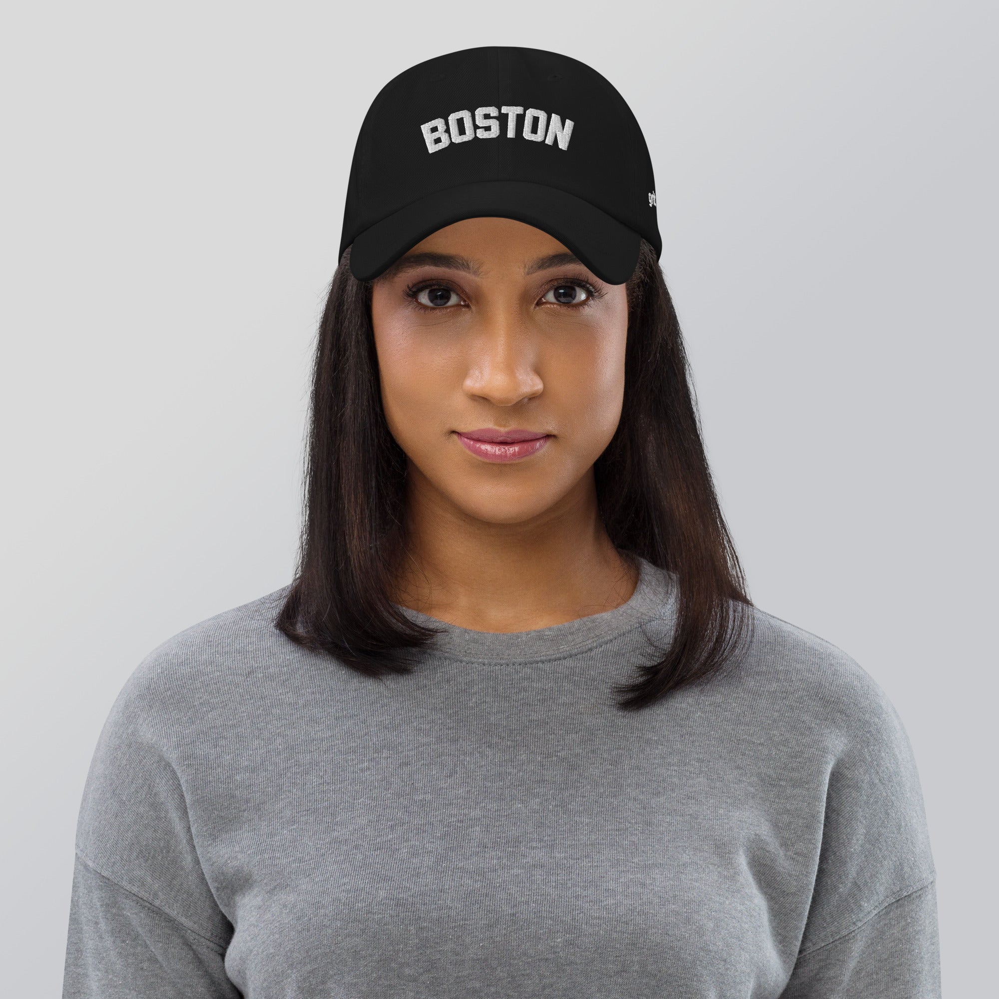 Washed black unstructured cap with ‘BOSTON’ embroidered on the front and ‘Grit & Grace’ on the side.
