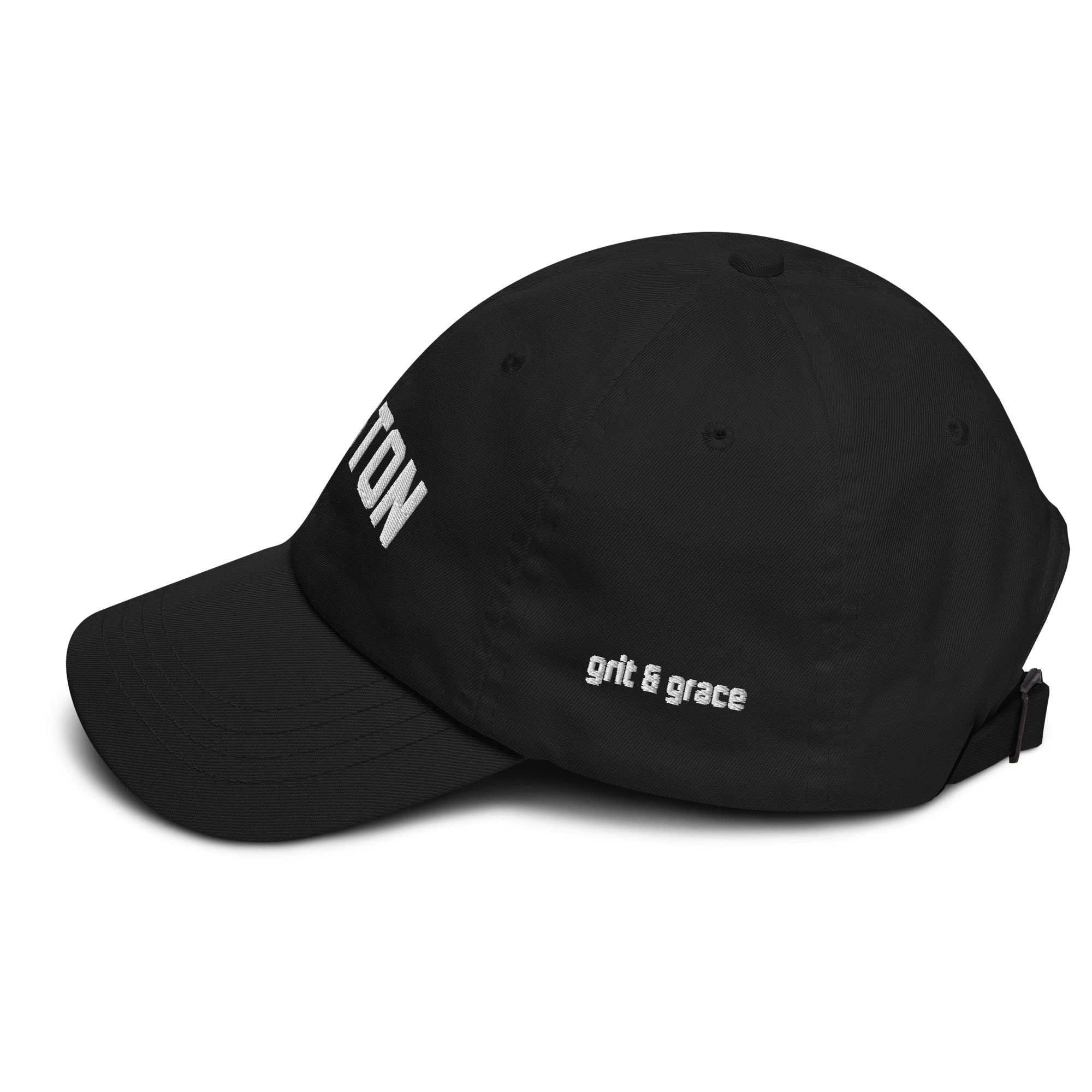 Washed black unstructured cap with ‘BOSTON’ embroidered on the front and ‘Grit & Grace’ on the side.